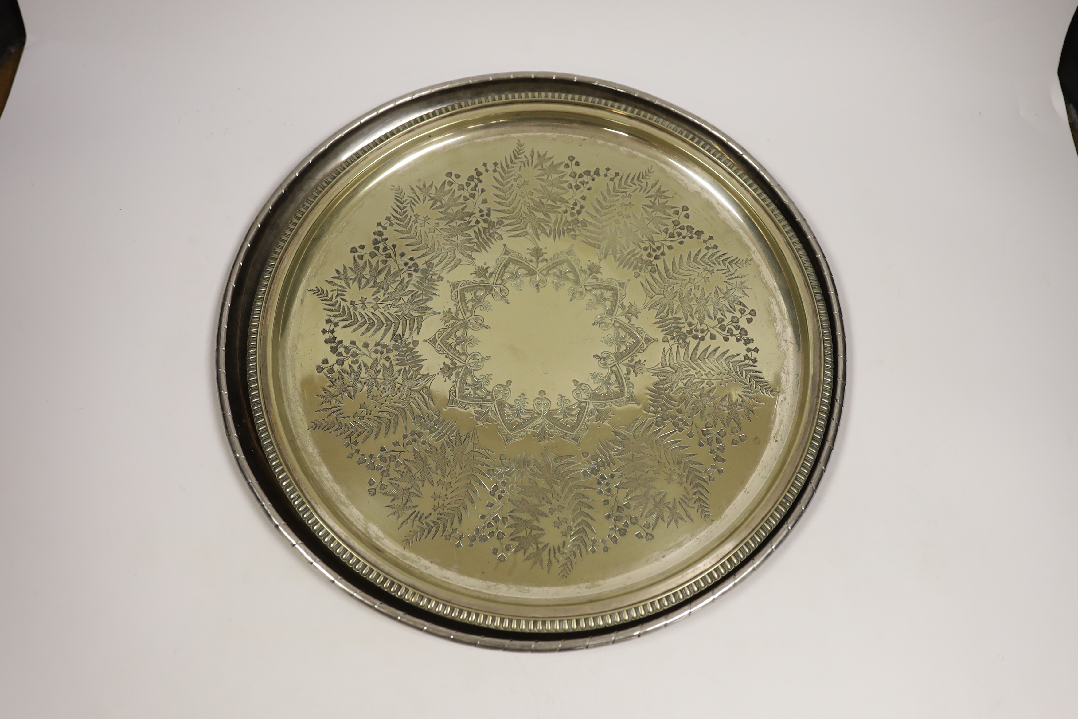 An Old Sheffield plate bowl, five napkin rings, and two salvers, largest 38cm diameter